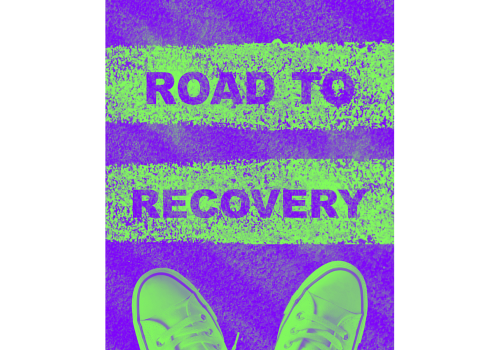 Image of 2 feet in gym shoes at 2 painted lines saying "Road to Recovery," in purple and green